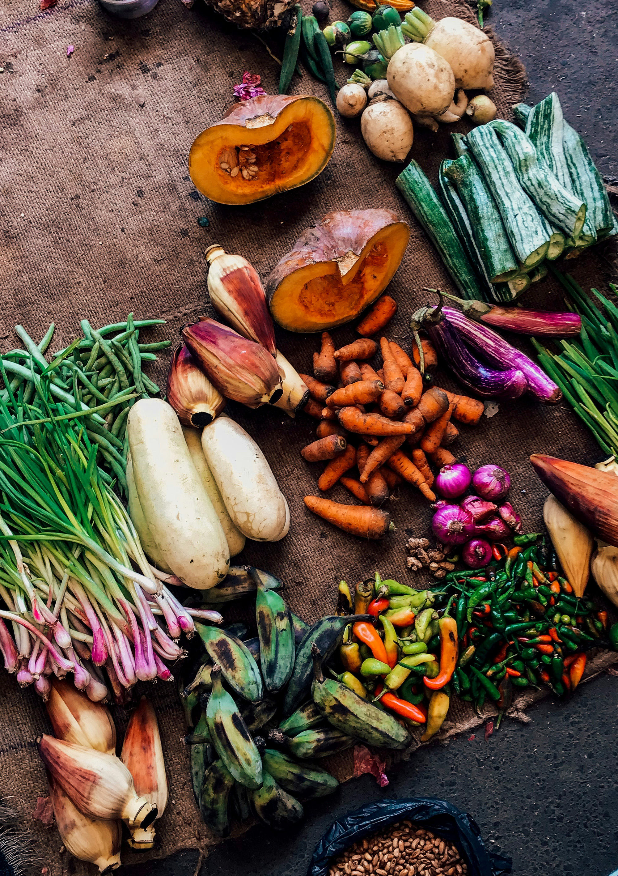 produce sitting atop a burlap sack